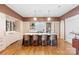 Bright kitchen with custom island seating, modern pendant lighting, and stylish countertops at 1172 Queens Rd, Charlotte, NC 28207