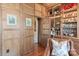 A well-appointed room features a wooden bar, rich wood paneling, and a comfortable leather chair at 1172 Queens Rd, Charlotte, NC 28207