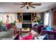 Bright living room featuring a fireplace, custom built-ins, and stylish furnishings at 12150 Plover Dr, Charlotte, NC 28269