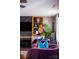 Cozy living room with luxurious seating, and custom built-in shelves with decor at 12150 Plover Dr, Charlotte, NC 28269