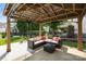 Outdoor gazebo with comfortable seating, perfect for relaxing and entertaining guests at 12312 Mcallister Park Dr, Charlotte, NC 28277
