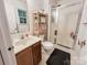 The bright and tidy bathroom has an inviting atmosphere and neutral colors with a standing shower at 125 Shenandoah Loop, Troutman, NC 28166