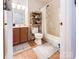 Bathroom with tile floors, standard fixtures, and shower with curtain at 125 Shenandoah Loop, Troutman, NC 28166