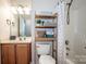 A functional bathroom with a vanity, toilet, and shower/tub combination at 125 Shenandoah Loop, Troutman, NC 28166