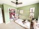 The room offers a light-colored carpet, a soft color palette, a closet, and a house frame bed at 125 Shenandoah Loop, Troutman, NC 28166