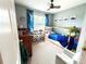 The bedroom has charming blue curtains with cartoon characters and a cozy under the house frame bed at 125 Shenandoah Loop, Troutman, NC 28166