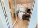 Open floor plan showcases dining area and living space with abundant natural light at 125 Shenandoah Loop, Troutman, NC 28166