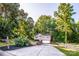 Charming home featuring a well-manicured lawn and an attached garage at 125 Shenandoah Loop, Troutman, NC 28166