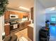 Well-maintained kitchen featuring stainless steel appliances and warm wood cabinetry at 125 Shenandoah Loop, Troutman, NC 28166