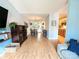 Open-concept living room and dining area featuring stylish furnishings and natural light at 125 Shenandoah Loop, Troutman, NC 28166
