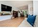 Inviting living room with wood laminate floors, comfortable seating and a flat screen TV at 125 Shenandoah Loop, Troutman, NC 28166