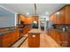 Well-equipped kitchen with stainless steel appliances, center island, and ample cabinet storage space at 129 N Audubon Ave, Mooresville, NC 28117
