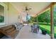Covered patio featuring a comfortable seating area and ceiling fans at 129 N Audubon Ave, Mooresville, NC 28117