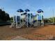A colorful community playground equipped with slides, climbing structures, and play areas for enjoyment at 129 N Audubon Ave, Mooresville, NC 28117