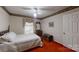 Bedroom with a white bed, wood furniture, and a window with blinds at 139 Cricket Creek Dr, Cherryville, NC 28021