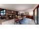 Dining room featuring a decorative chandelier, vintage furnishings, and a brick fireplace at 139 Cricket Creek Dr, Cherryville, NC 28021