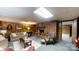 Inviting living room with a fireplace, comfortable seating, and wood-paneled walls at 139 Cricket Creek Dr, Cherryville, NC 28021
