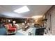 Spacious living room featuring a fireplace, built-in bookshelves, and comfortable furniture at 139 Cricket Creek Dr, Cherryville, NC 28021