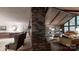 Living room featuring wood floors, brick fireplace and wood ceiling at 139 Cricket Creek Dr, Cherryville, NC 28021