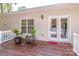 Outdoor living on the back deck with room for seating and access to home through french doors at 146 Valley Glen Dr, Troutman, NC 28166