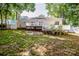 Spacious backyard with a multi-level deck and lush green lawn at 146 Valley Glen Dr, Troutman, NC 28166