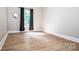 Spacious bedroom with wood-look flooring and a window at 146 Valley Glen Dr, Troutman, NC 28166