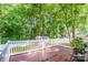 Exterior deck offers ample space to unwind while overlooking lush greenery at 146 Valley Glen Dr, Troutman, NC 28166