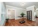 Inviting foyer with hardwood floors, large windows, and a decorative display table at 146 Valley Glen Dr, Troutman, NC 28166