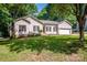 Beautiful single-story home with a well-manicured lawn, attached garage, and inviting curb appeal at 146 Valley Glen Dr, Troutman, NC 28166