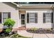 Inviting front entrance with a well-maintained yard and classic exterior details at 146 Valley Glen Dr, Troutman, NC 28166