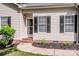 Charming home exterior with well-maintained landscaping, walkway, and inviting entrance at 146 Valley Glen Dr, Troutman, NC 28166