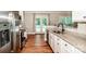 Bright kitchen featuring stainless steel appliances and access to the outdoor area at 146 Valley Glen Dr, Troutman, NC 28166