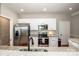 Updated kitchen featuring granite counters, white cabinets, and stainless steel appliances at 146 Valley Glen Dr, Troutman, NC 28166