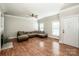 Inviting living room with hardwood floors, a neutral color palette, and ample natural light at 146 Valley Glen Dr, Troutman, NC 28166