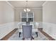 Elegant dining room with modern glass table, stylish chairs, and sophisticated lighting, perfect for entertaining at 14734 Rivergate Pkwy, Charlotte, NC 28273