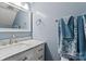 Bathroom with marble countertop, silver faucet, towel rings, and decorative towels at 1543 Newfound Hollow Dr, Charlotte, NC 28214