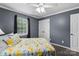Comfortable bedroom with grey walls, neutral carpet and window at 1543 Newfound Hollow Dr, Charlotte, NC 28214