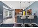 Eat-in kitchen featuring modern stainless appliances, granite counter tops, and breakfast bar at 1543 Newfound Hollow Dr, Charlotte, NC 28214