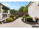 Backyard patio area with gazebo, manicured shrubbery, and mature trees at 175 Mcleod Ave, Belmont, NC 28012