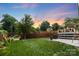 Spacious backyard with green lawn, deck, and privacy fence at 175 Mcleod Ave, Belmont, NC 28012