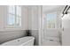 Elegant bathroom featuring a soaking tub, tiled shower, and updated fixtures at 175 Mcleod Ave, Belmont, NC 28012