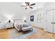 Bright bedroom with windows, hardwood floors, and elegant white furniture at 175 Mcleod Ave, Belmont, NC 28012