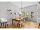 Bright dining room features hardwood floors, shutters, and a modern light fixture at 175 Mcleod Ave, Belmont, NC 28012