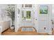 Bright foyer with hardwood floors, a decorative rug, and modern finishes creates a welcoming entrance at 175 Mcleod Ave, Belmont, NC 28012