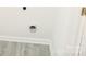 The image displays a wall-mounted utility access at 1911 Flushing Ct, Charlotte, NC 28215