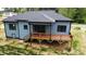 This home has a large wooden deck, perfect for entertaining or enjoying outdoor living and views at 2004 Plain Field Dr, Bessemer City, NC 28016