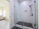 New bathroom features a sleek glass shower with updated fixtures and stylish tile work at 2004 Plain Field Dr, Bessemer City, NC 28016