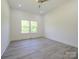 Large bedroom with high ceilings, ample natural light, and a ceiling fan for added comfort at 2004 Plain Field Dr, Bessemer City, NC 28016