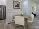 Cozy breakfast area with a round table and stylish white chairs, adjacent to the kitchen at 2004 Plain Field Dr, Bessemer City, NC 28016