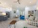 Open concept living space with modern furniture, a well-lit kitchen, and hardwood floors for a warm feel at 2004 Plain Field Dr, Bessemer City, NC 28016